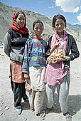 Ladakh - girls selling apricots to tourists 